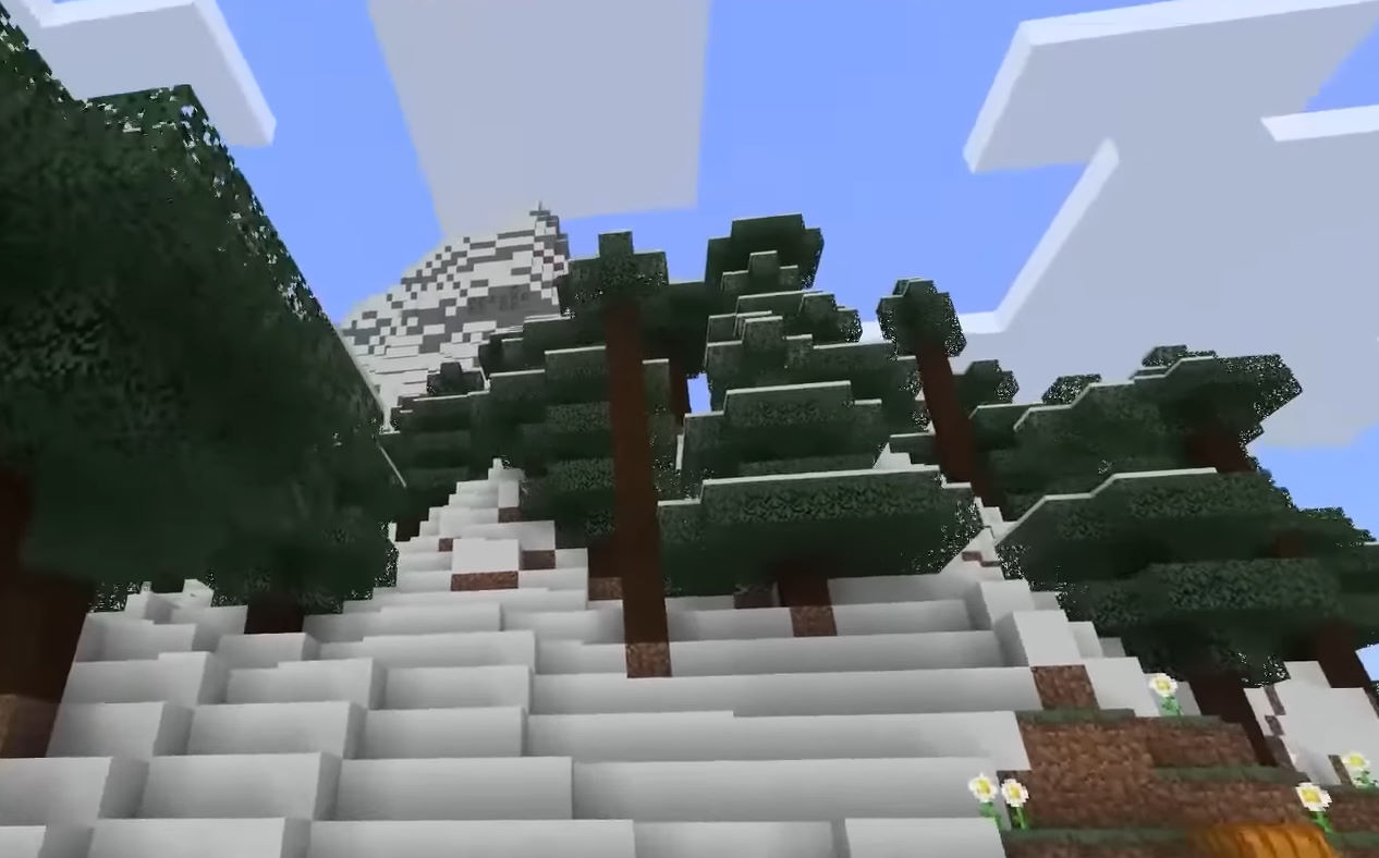 Minecraft landscape with spruce trees and a snowy mountain.